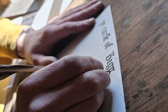 The village scribe writes in a fourteenth-century hand